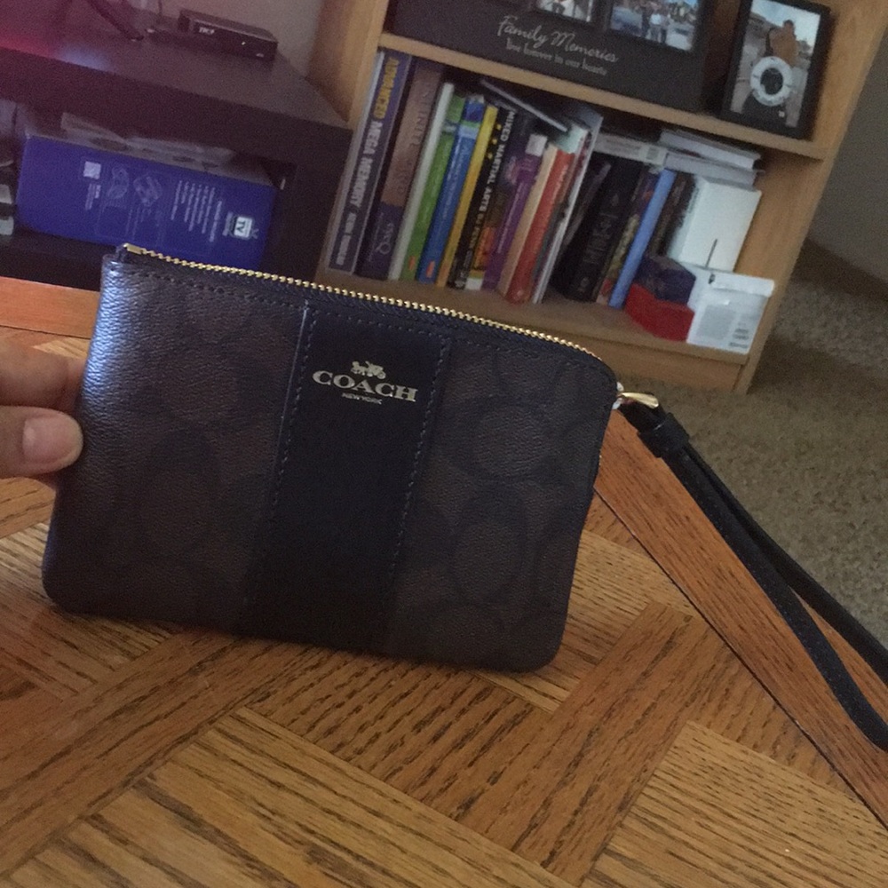 Wristlet brown and black color, Coach!